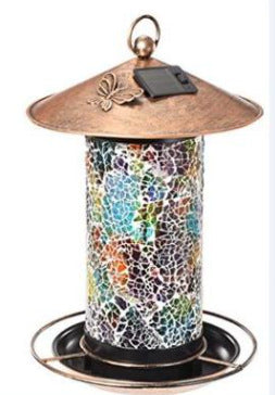 Colorful mosaic bird feeder with solar panel on top