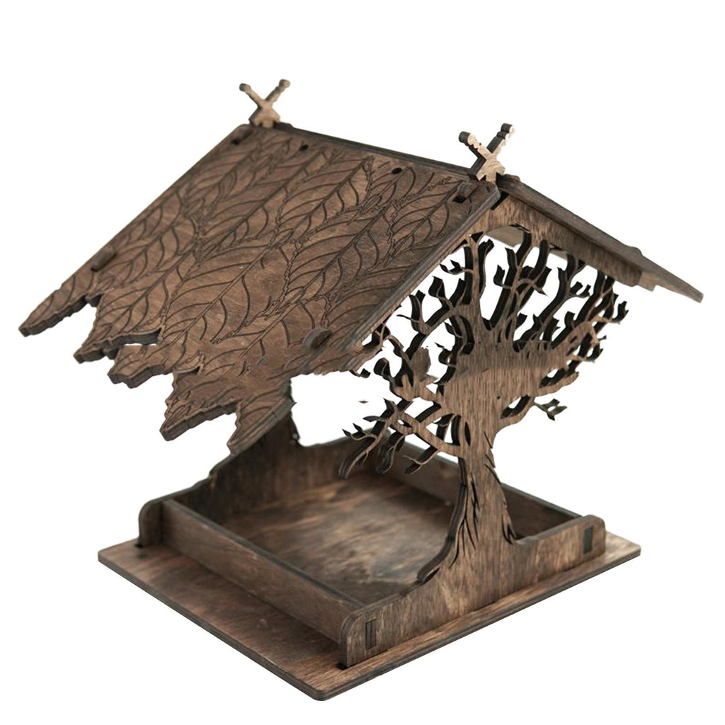 Wooden bird feeder with intricate design 