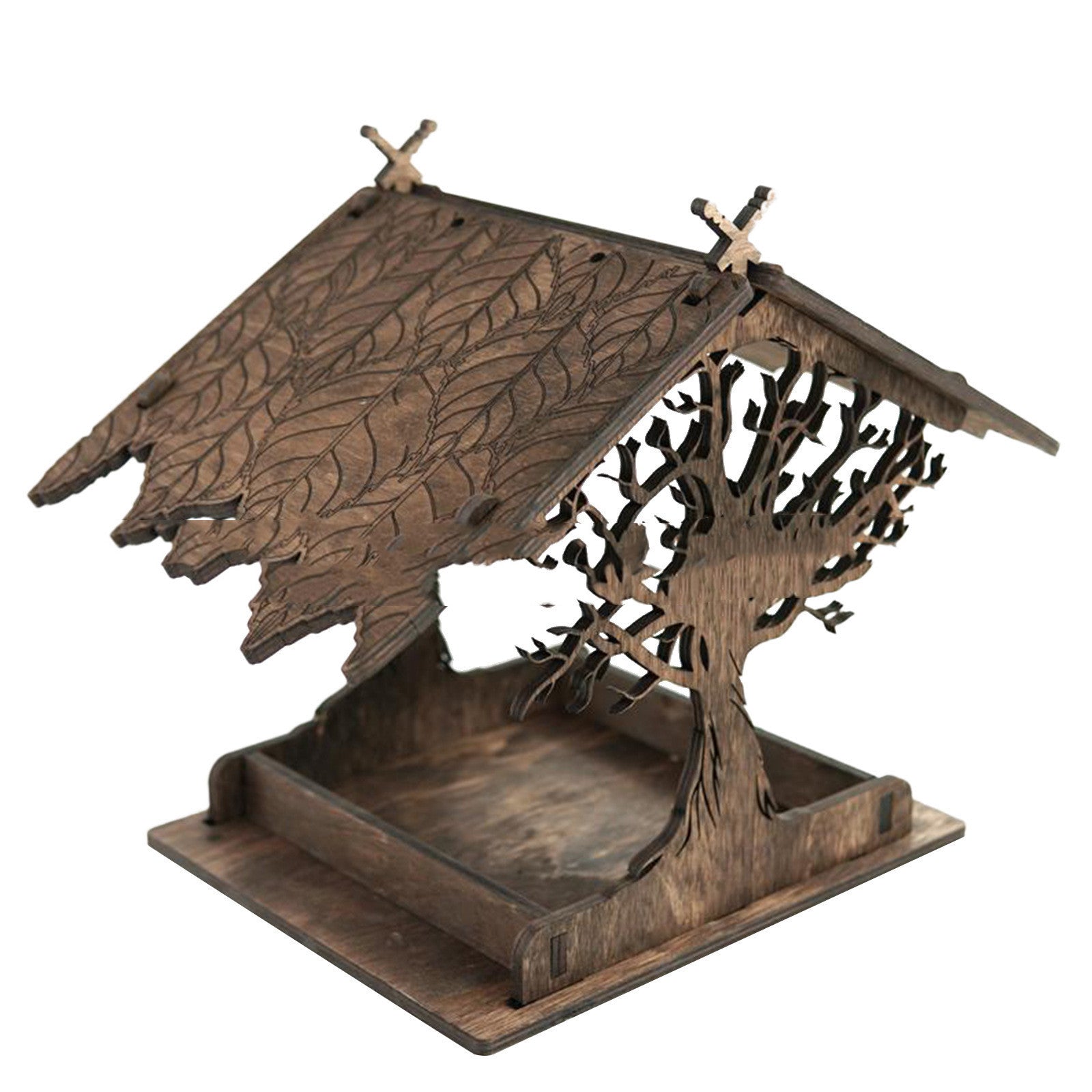 Wooden bird feeder with intricate design 