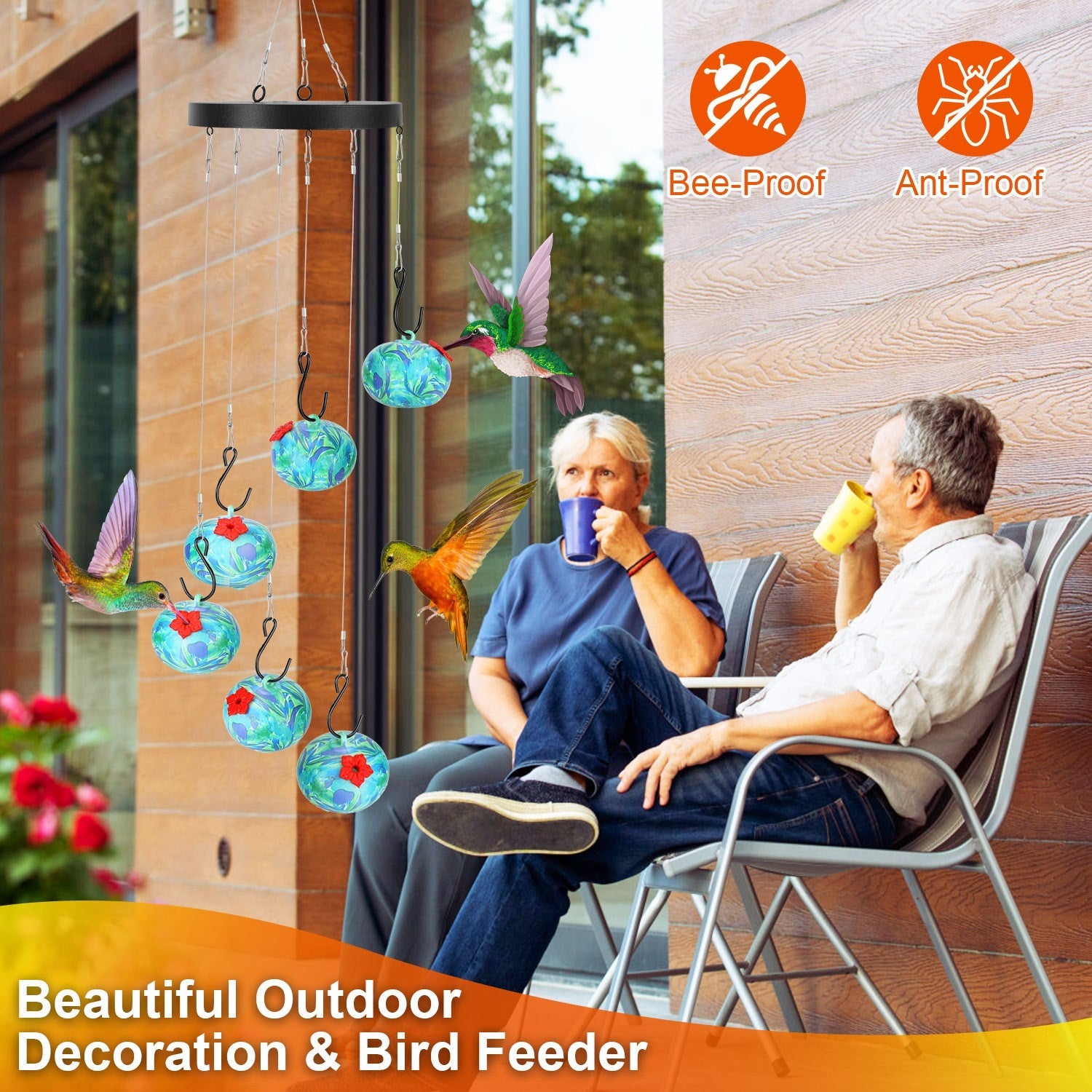 A couple sitting on a patio with bird feeders and colorful birds, featuring 'Bee-Proof' and 'Ant-Proof' labels.
