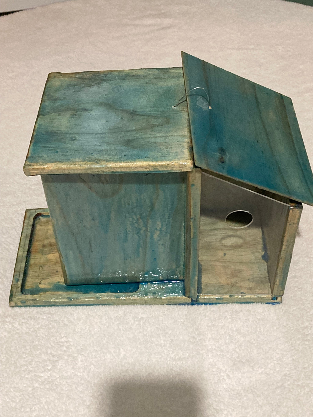 Side view of handcrafted bird condo birdhouse