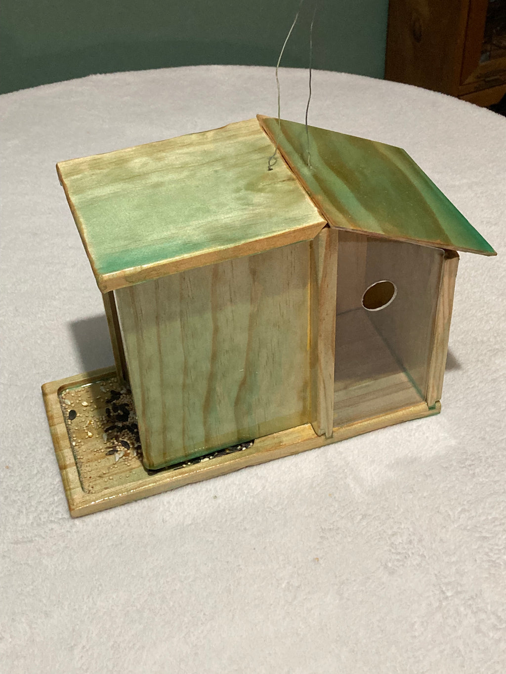 Bird condo showing interchangeable plastic panels