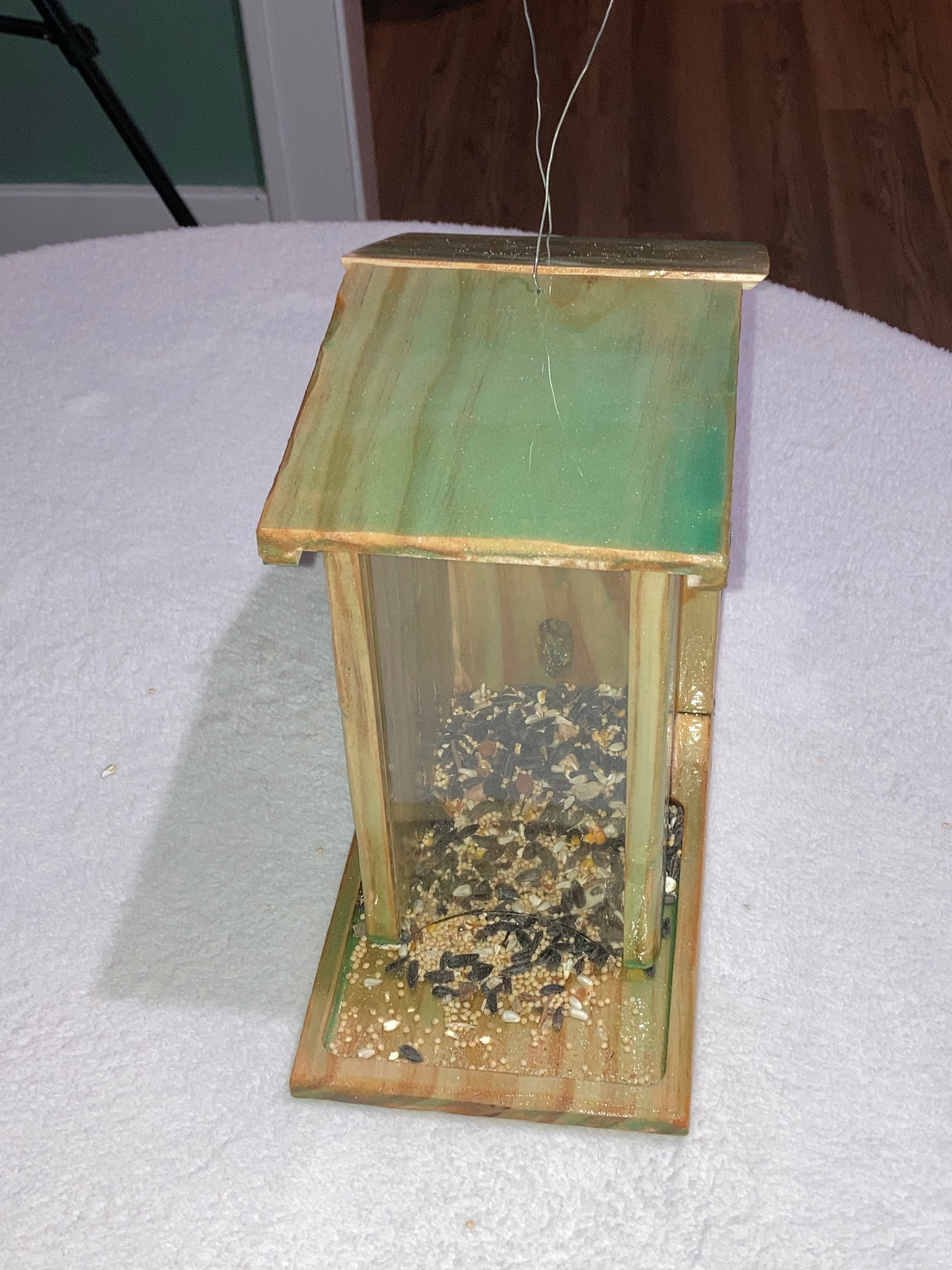 Bird condo convertible nesting box and feeder design